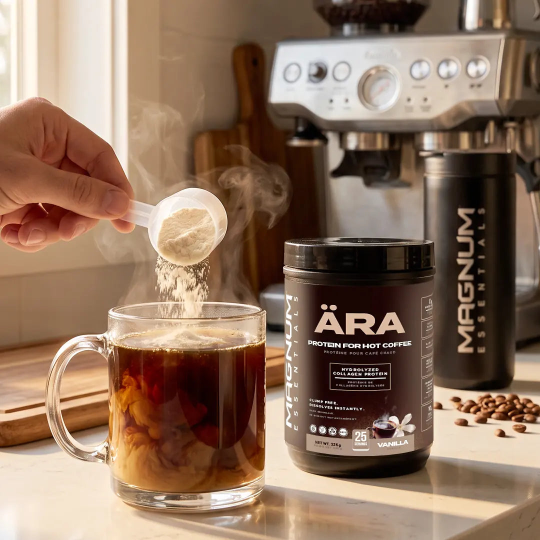 A scoop of ÄRA Vanilla pouring into a glass mug beside an espresso machine